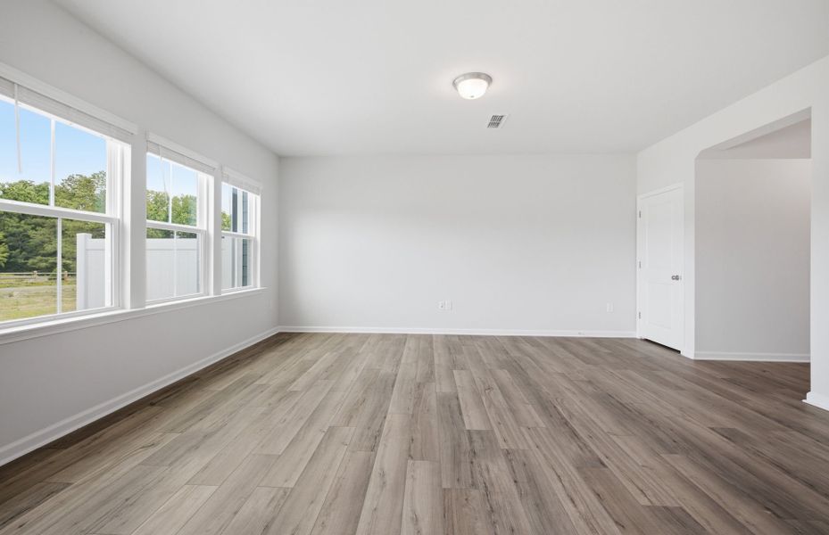 Spacious, unfurnished interior of a new home in Saunders Farm, Willow Spring (Image 28).