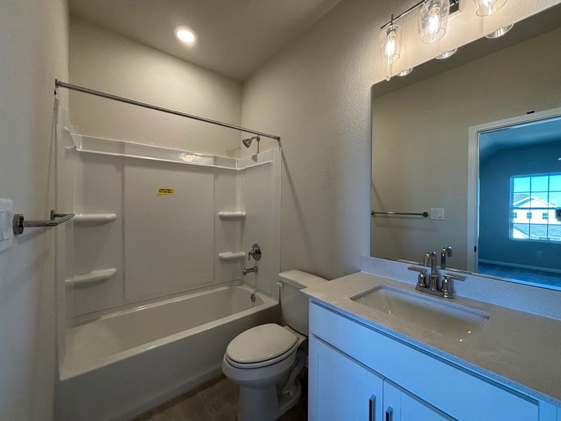 Furnished interior view inside a new home in Cannon Ranch 40s, Dripping Springs (Image 13).