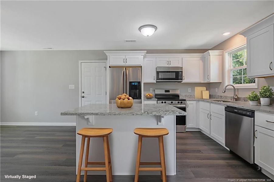 Extra seating at island Extra seating at island