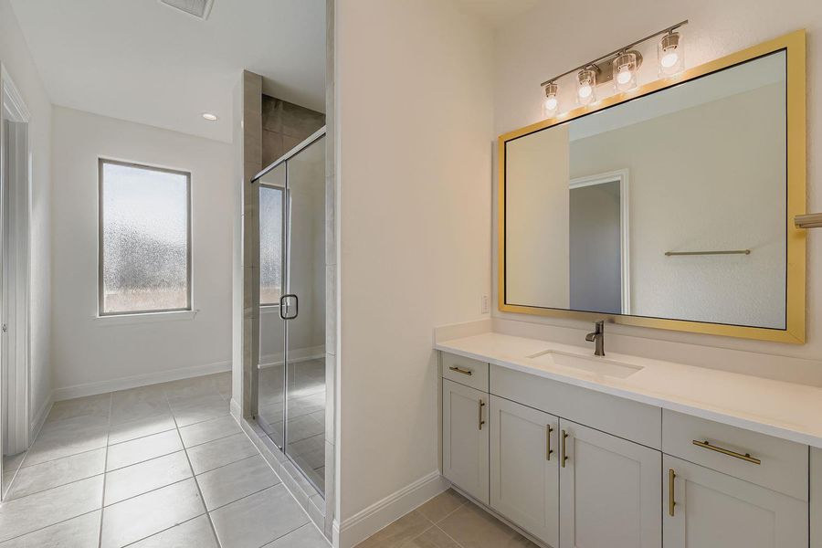 Furnished interior view inside a new home in 6 Creeks, Kyle (Image 4).