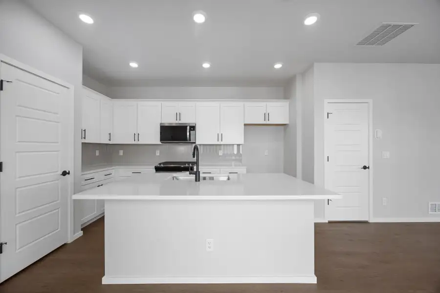 Furnished interior view inside a new home in Sky Ranch, Watkins (Image 42).