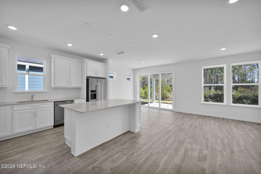 Furnished interior view inside a new home in Del Webb Wildlight, Yulee (Image 5).