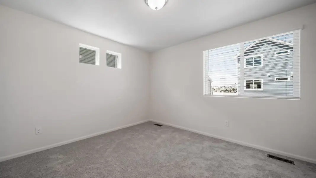 Spacious, unfurnished interior of a new home in Banning Lewis Ranch, Colorado Springs (Image 15).