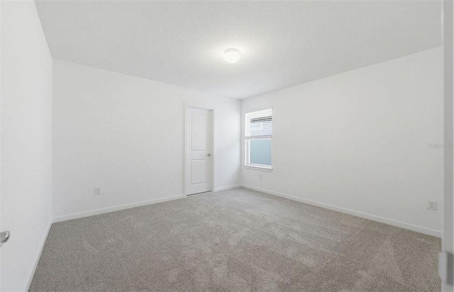 Spacious, unfurnished interior of a new home in Vida's Way, Wesley Chapel (Image 16).