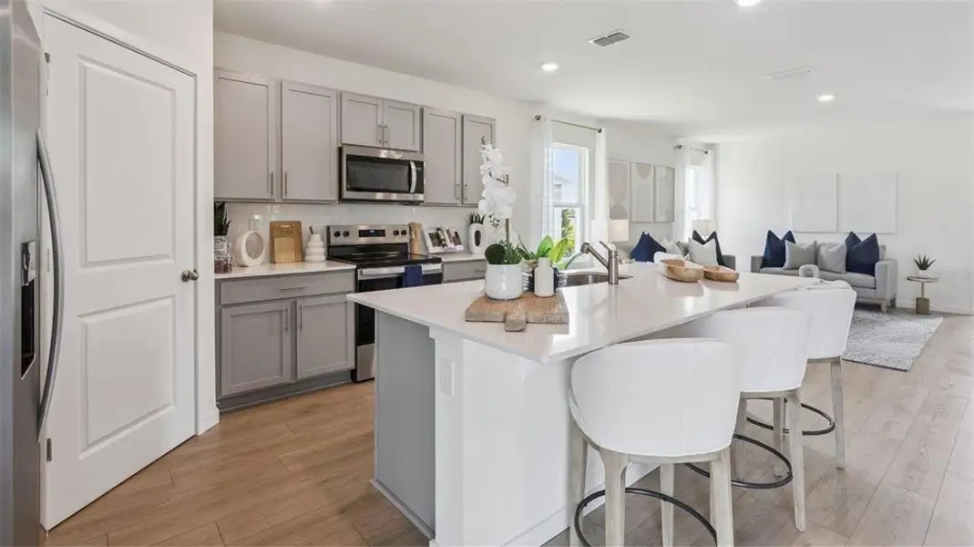 Furnished interior view inside a new home in , Apopka (Image 3).
