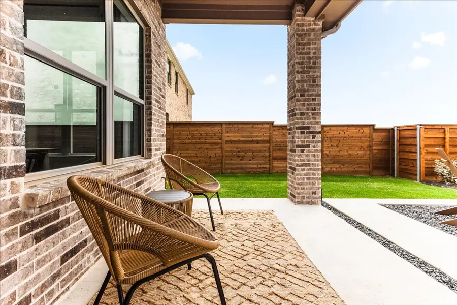 Exterior details and patio area of a home in Solterra Texas, Mesquite (Image 4).