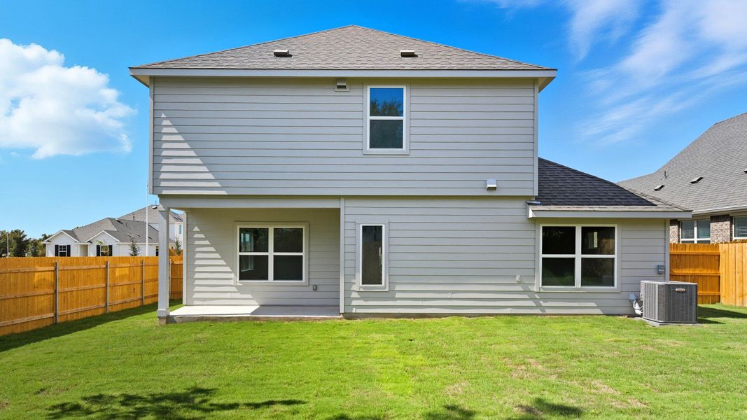 Exterior details and patio area of a home in Creeks Crossing, Elgin (Image 3).