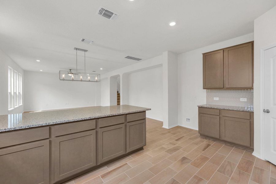 Furnished interior view inside a new home in Mustang Valley, Manor (Image 10).