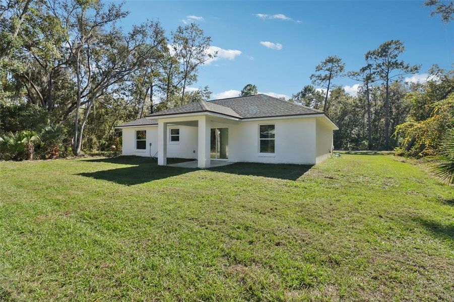 Exterior details and patio area of a home in , Ocklawaha (Image 22).