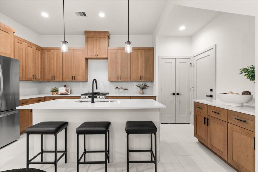 Kitchen – Previous work by the builder in the community, not representation of exact unit listed. Kitchen – Previous work by the builder in the community, not representation of exact unit listed.