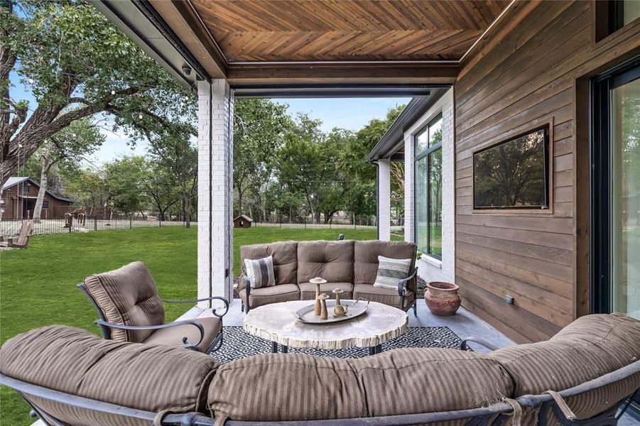 Sunroom / solarium with wood ceiling