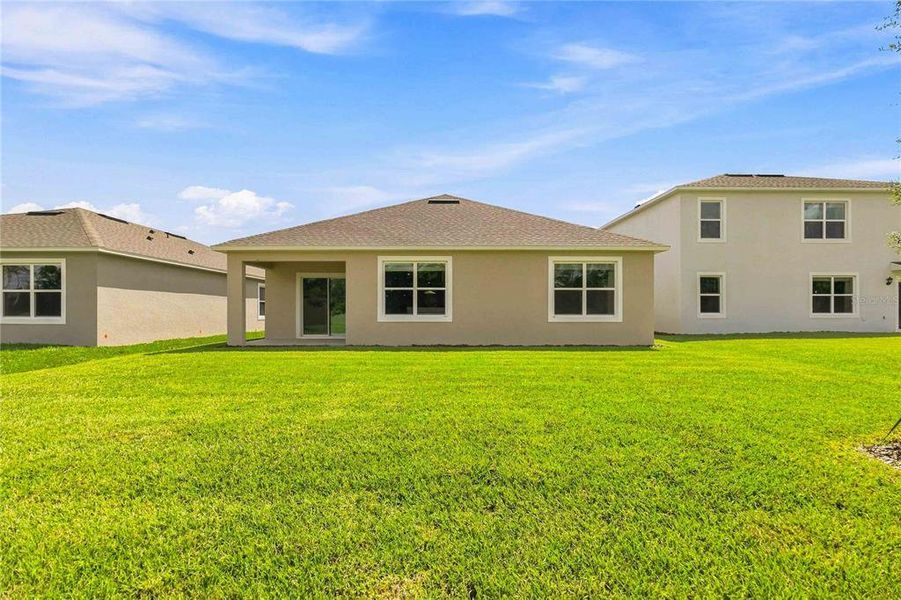 Exterior details and patio area of a home in Ironwood, Daytona Beach (Image 3).