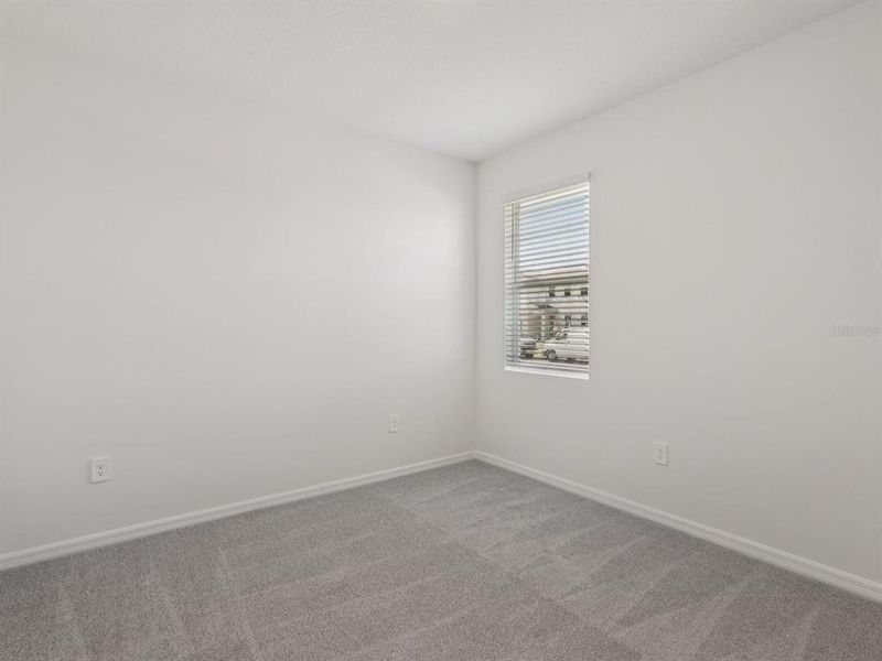 Spacious, unfurnished interior of a new home in Coasterra - Reserve Series, Palmetto (Image 27).