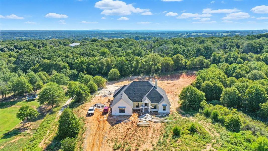 View of subject property with a heavily wooded area View of subject property with a heavily wooded area