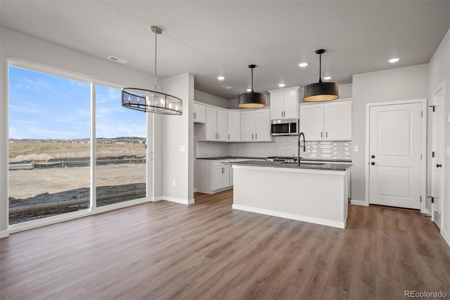 Spacious, unfurnished interior of a new home in Revel Crossing at Wolf Ranch – The Ascent Collection, Colorado Springs (Image 25).