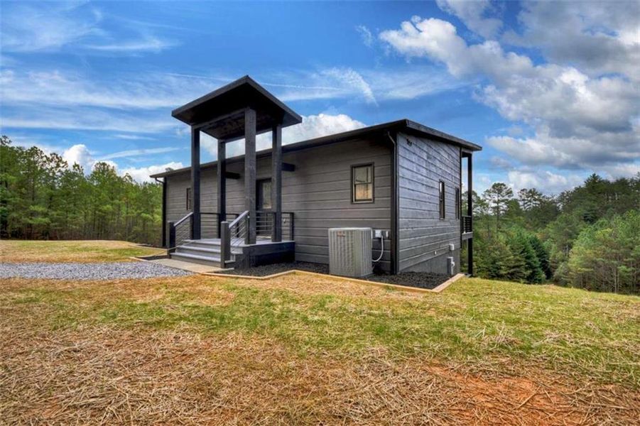 Exterior details and patio area of a home in , Turtletown (Image 18). Exterior details and patio area of a home in , Turtletown (Image 18).