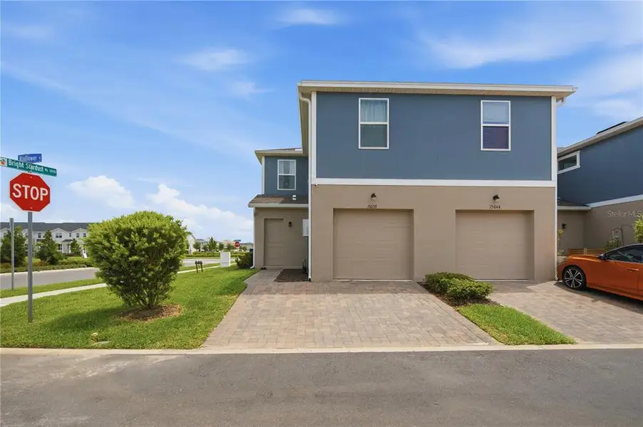 Front exterior of a new home in , Winter Garden, FL, highlighting curb appeal (Image 22). Front exterior of a new home in , Winter Garden, FL, highlighting curb appeal (Image 22).