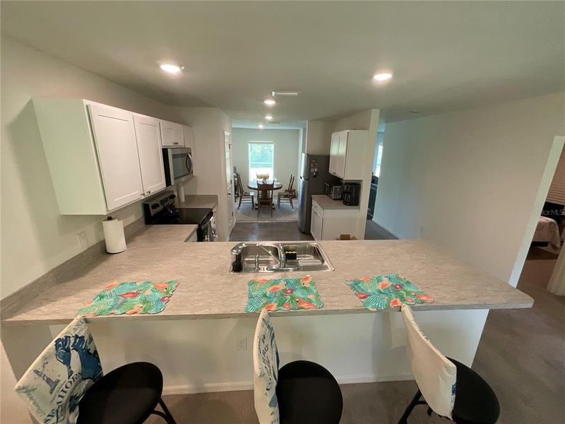 Furnished interior view inside a new home in , Port Charlotte (Image 10).