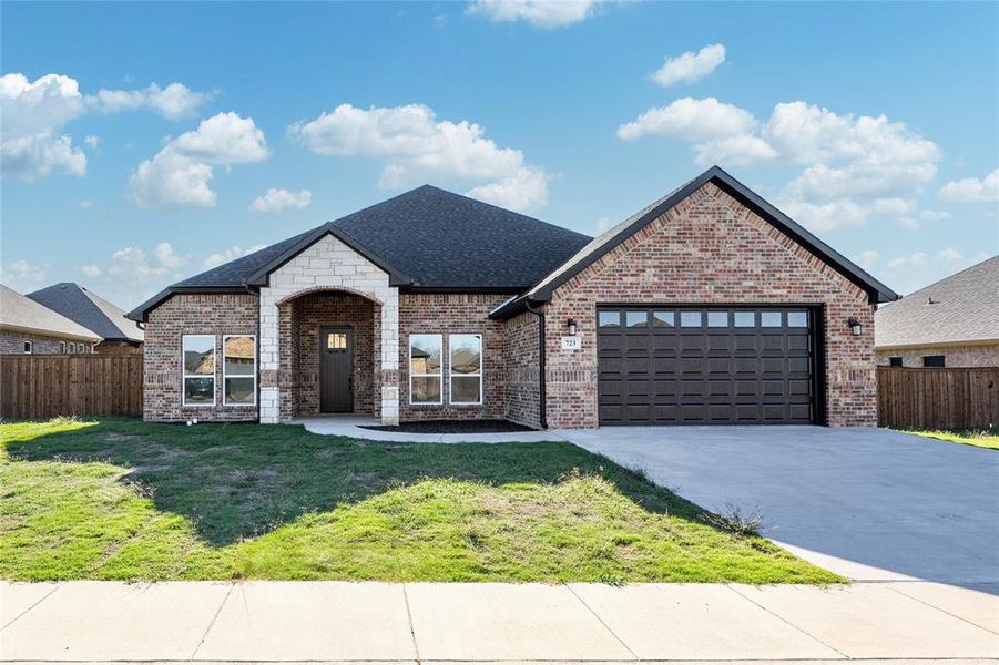 Front exterior of a new home in , Mabank, TX, highlighting curb appeal (Image 1).