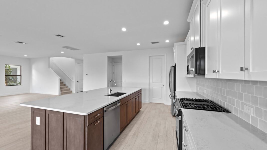 Furnished interior view inside a new home in SkySail, Naples (Image 6).