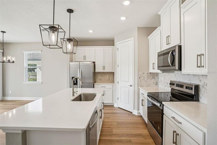 Furnished interior view inside a new home in Legends Preserve - Signature Series, Daytona Beach (Image 8).