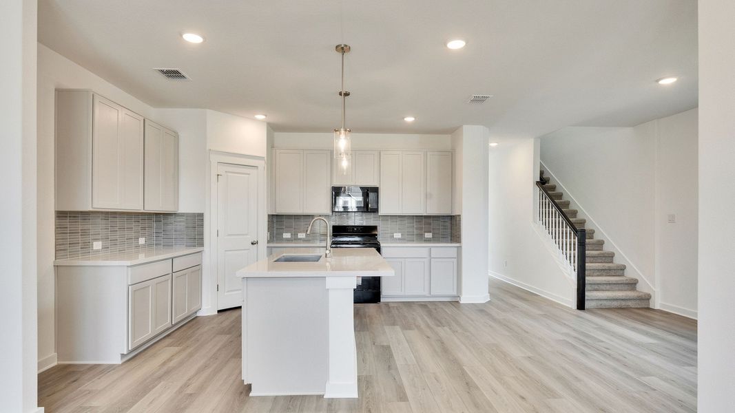 Furnished interior view inside a new home in Creeks Crossing, Elgin (Image 8).