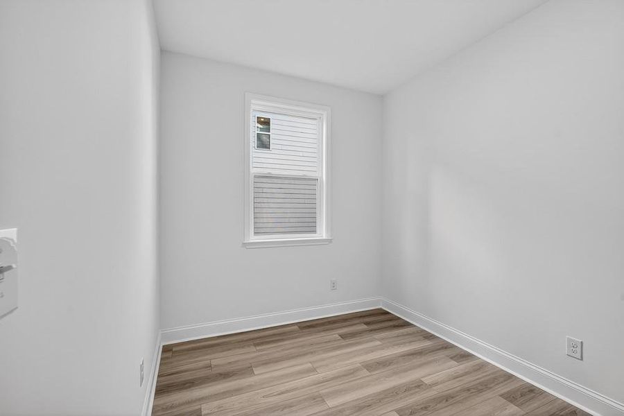 Spacious, unfurnished interior of a new home in Bailey Fence, Dacula (Image 44).