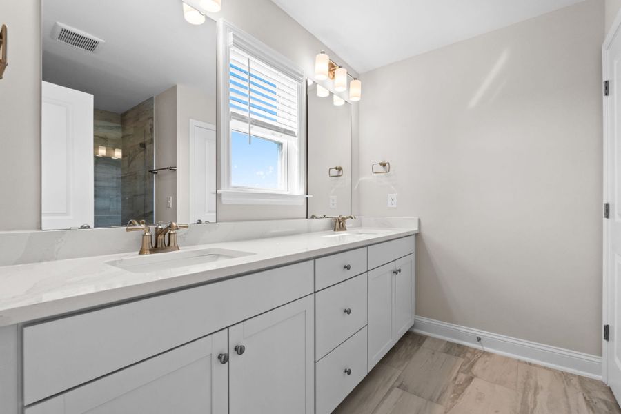 Furnished interior view inside a new home in Lakeside Townes at Riverlights, Wilmington (Image 12).