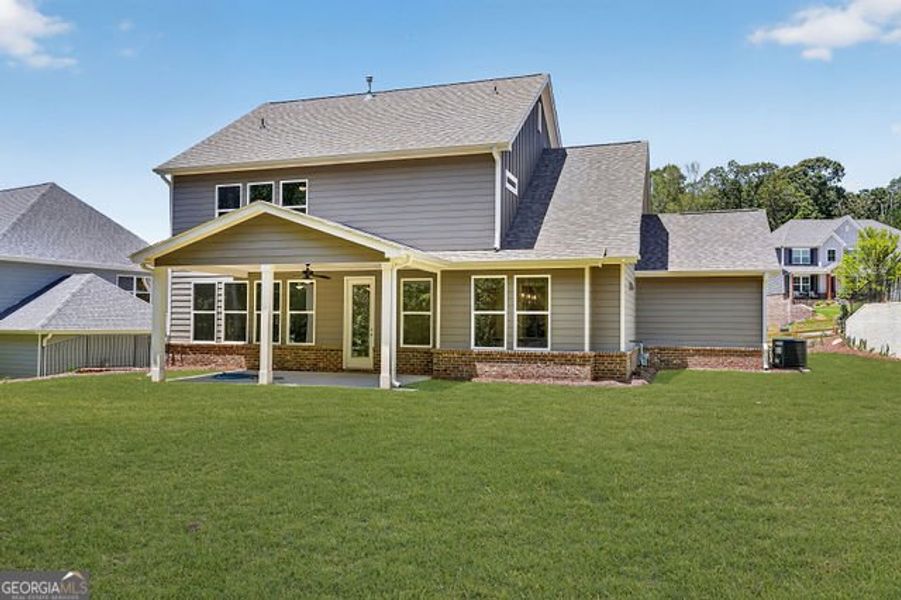 Exterior details and patio area of a home in The Manor at Gainesville Township, Gainesville (Image 19).