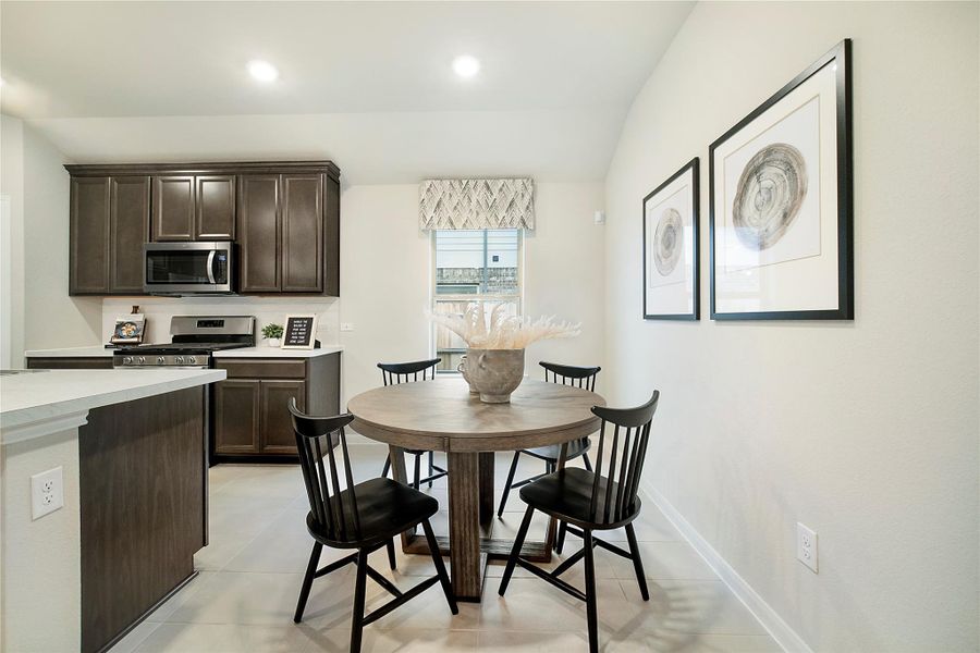 Sample photo of completed home with similar floor plan. As-built color and selections may vary.