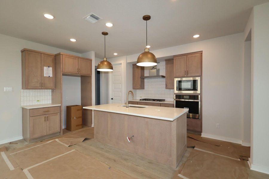 Furnished interior view inside a new home in Flora, Hutto (Image 12).