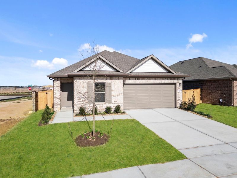 Front exterior of a new home in Cypress Green, Hockley, TX, highlighting curb appeal (Image 22).