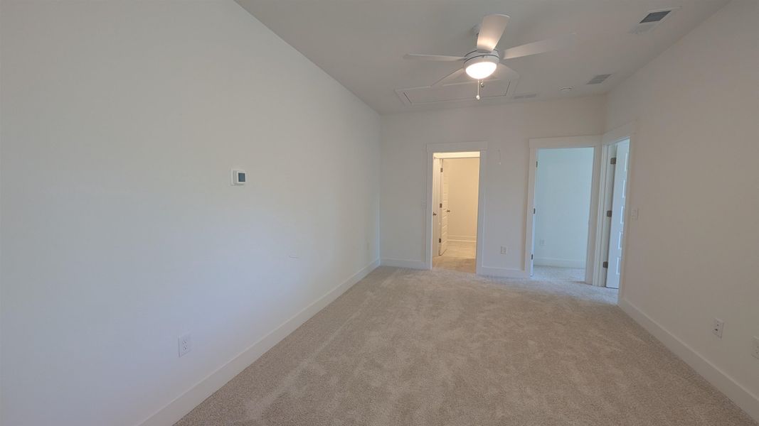 Spacious, unfurnished interior of a new home in Long Bay Golf Club, Longs (Image 30).