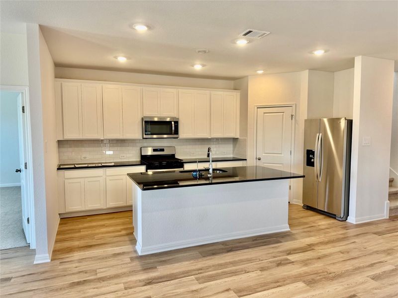 Furnished interior view inside a new home in Waterstone Crossing, Kyle (Image 3). Furnished interior view inside a new home in Waterstone Crossing, Kyle (Image 3).