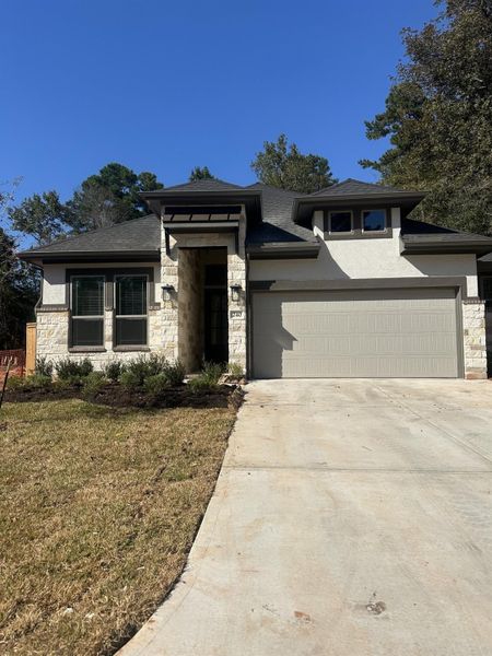 Exterior details and patio area of a home in The Woodlands Hills, Willis (Image 2). Exterior details and patio area of a home in The Woodlands Hills, Willis (Image 2).