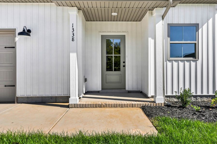 Exterior details and patio area of a home in Fletchers Bend, Clarksville (Image 2). Exterior details and patio area of a home in Fletchers Bend, Clarksville (Image 2).