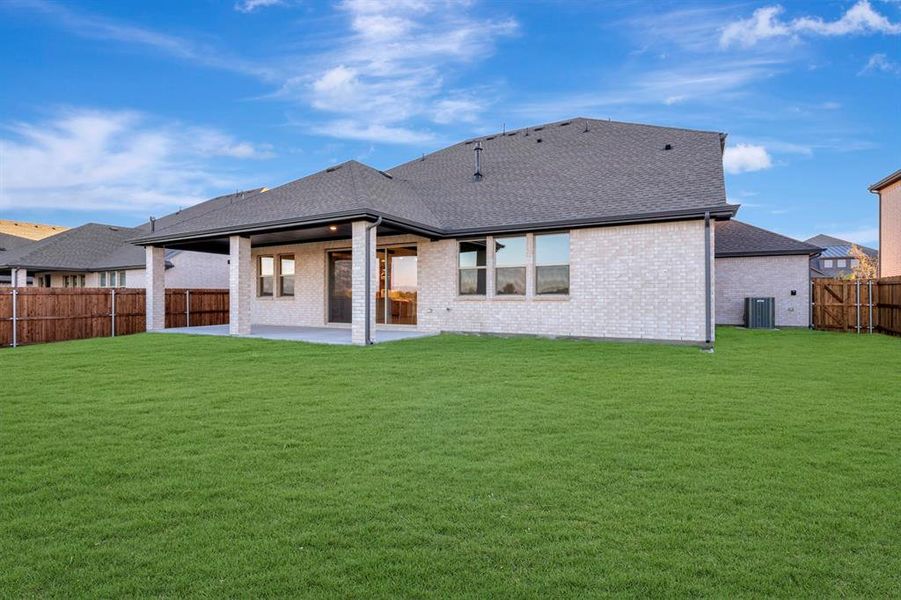 Exterior details and patio area of a home in Elevon, Lavon (Image 24).