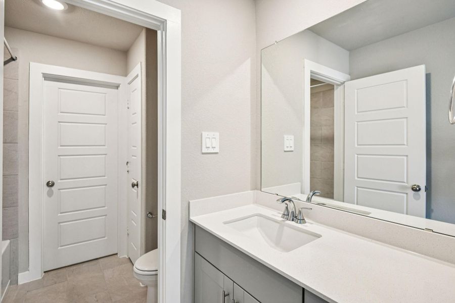 Furnished interior view inside a new home in Pine Lake Cove - Premier Series, Montgomery (Image 16).