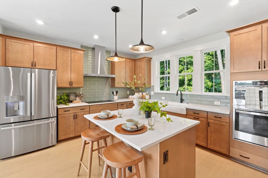 Representative furnished interior of a home built from the Piper by Tri Pointe Homes in Twinleaf Townes, Chapel Hill (Image 6).