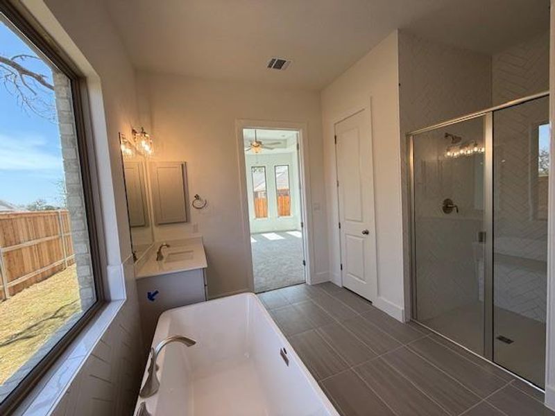 Dual vanities with large soaking tub in Primary Bath Dual vanities with large soaking tub in Primary Bath