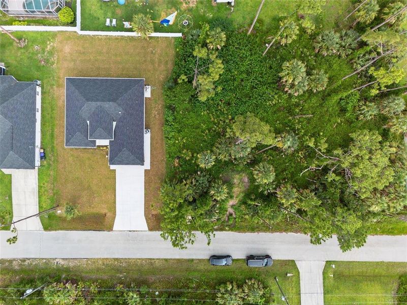 Front exterior of a new home in , North Port, FL, highlighting curb appeal (Image 25). Front exterior of a new home in , North Port, FL, highlighting curb appeal (Image 25).