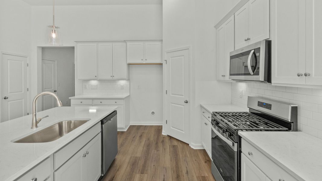 Furnished interior view inside a new home in Bluffs at Sun Colony, Longs (Image 11).
