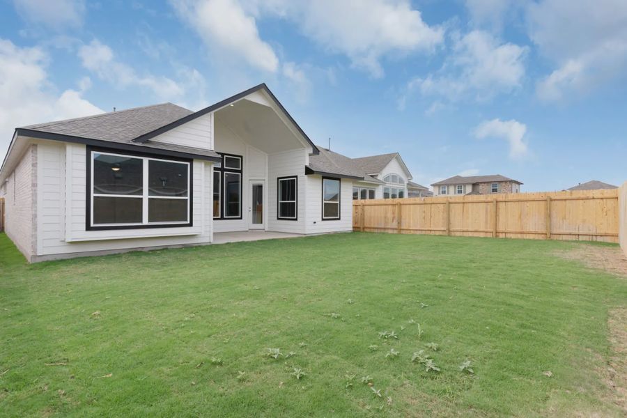 Exterior details and patio area of a home in Newhaven, Manor (Image 3).