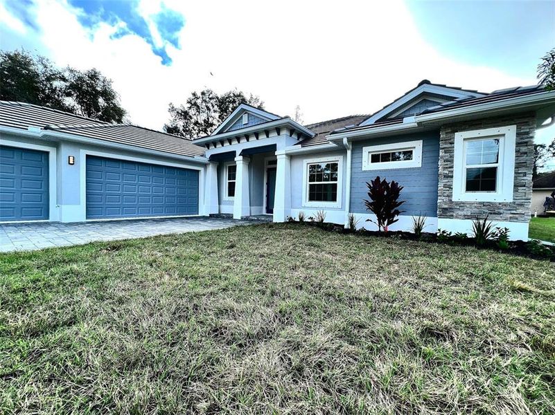 Exterior details and patio area of a home in , North Port (Image 2).