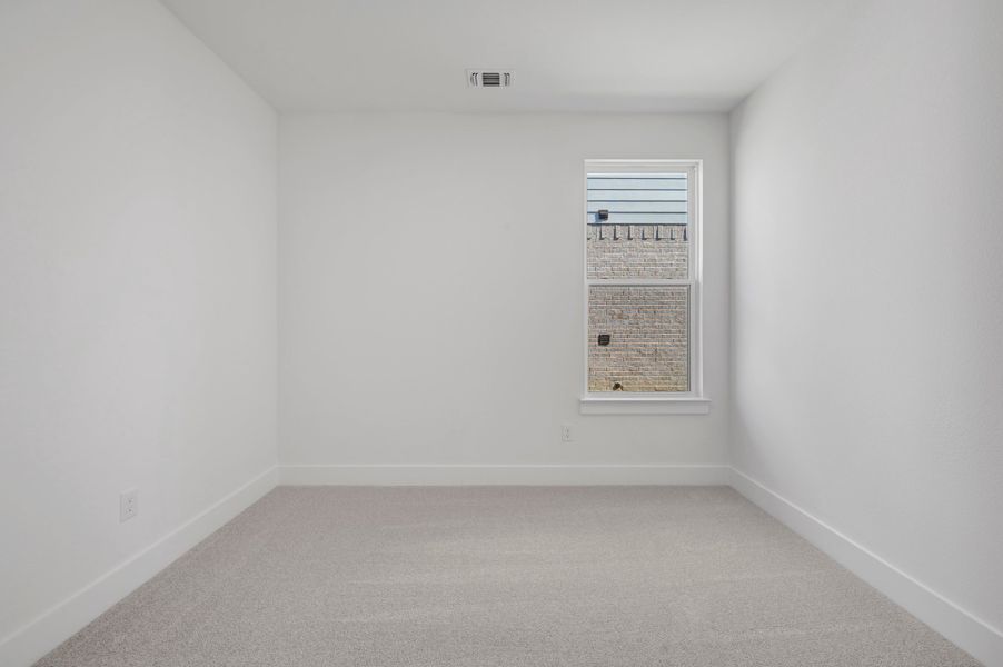 Spacious, unfurnished interior of a new home in The Meadows, Denton (Image 26).