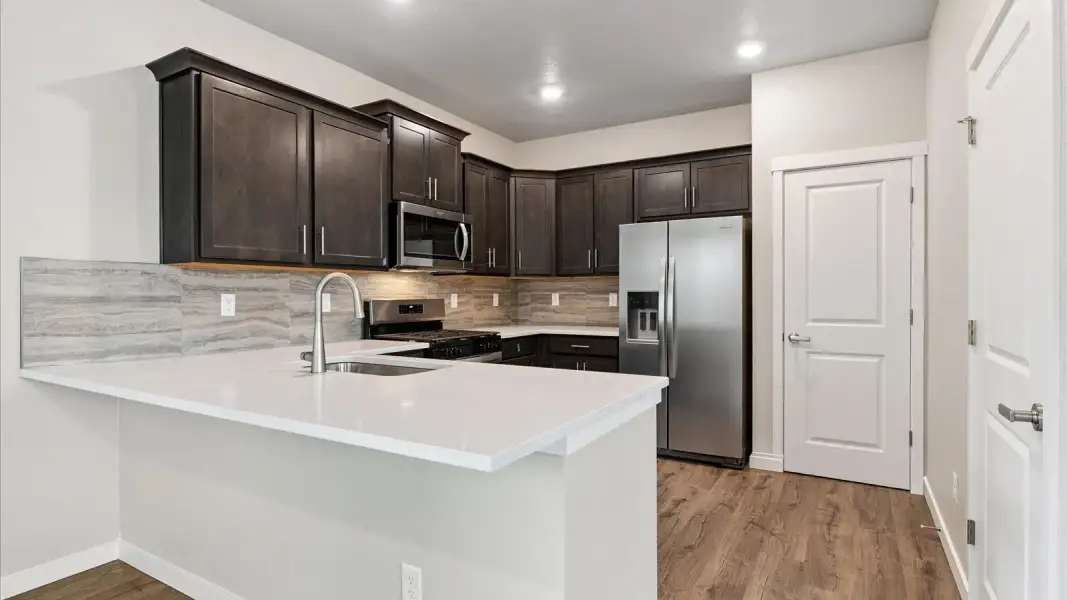 Furnished interior view inside a new home in Sky Ranch, Watkins (Image 6).