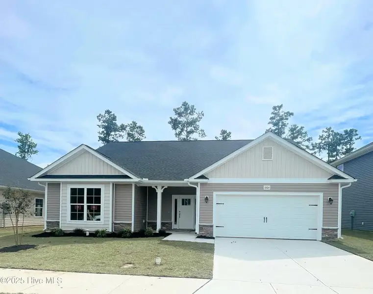 Front exterior of a new home in Athens Acres, New Bern, NC, highlighting curb appeal (Image 1).