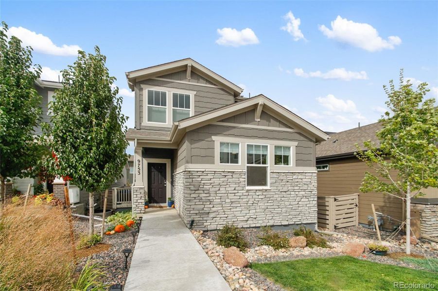 Front exterior of a new home in Sterling Ranch Prospect Village, Littleton, CO, highlighting curb appeal (Image 2).