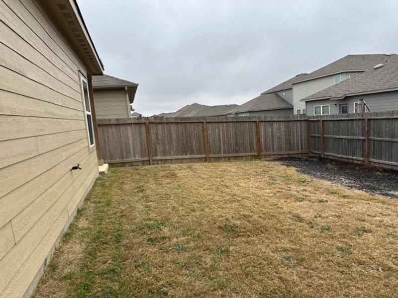Exterior details and patio area of a home in Spring Valley, New Braunfels (Image 12).