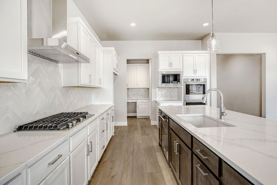 Furnished interior view inside a new home in RainDance, Windsor (Image 12).